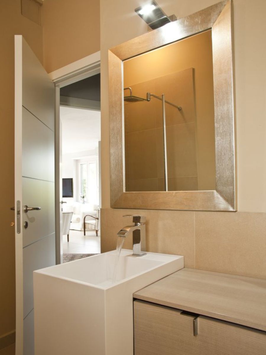 Bathroom mirror with gold frame